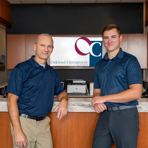 Chiropractor-Commerce-Township-MI-Gary-Sclabassi-and-Marc-Sclabassi-LP-Portrait.webp
